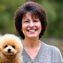Portrait of Ms. Nakamura with her toy poodle, Hana.