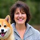 Portrait of Ms. Suzuki with her corgi, Lemon.